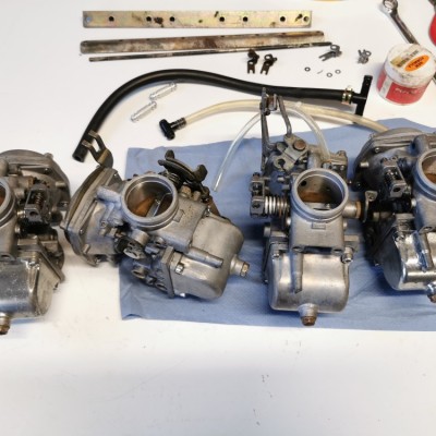 Carburettors undergoing ultrasonic cleaning